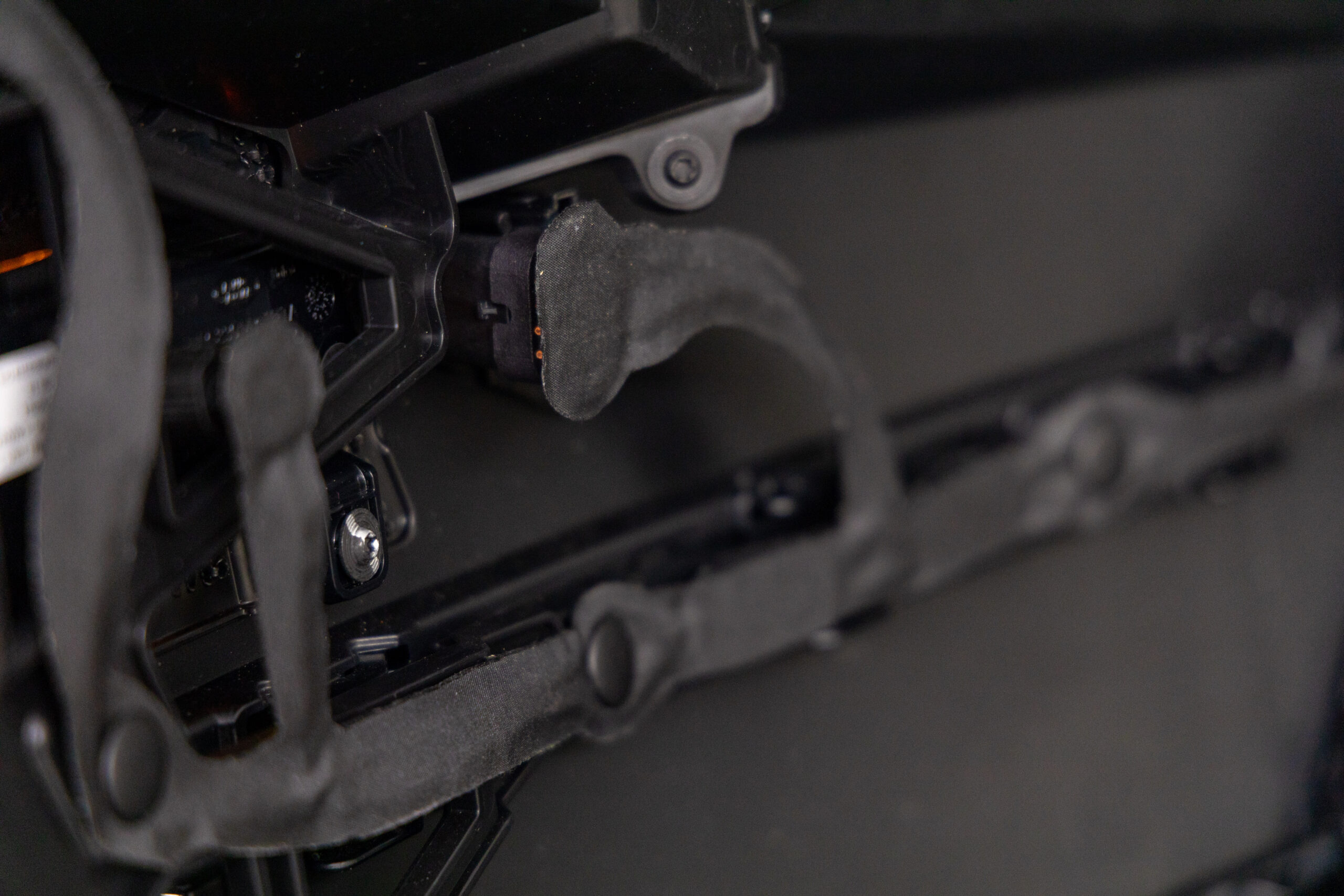 A flat, flexible harness installed in a car bumper - Made automatically