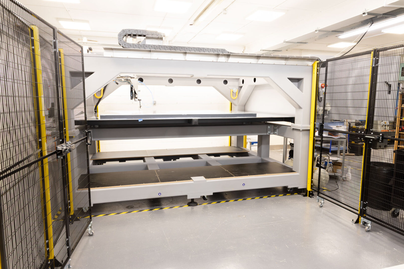 SQ25 with safety cage open in Q5D workshop